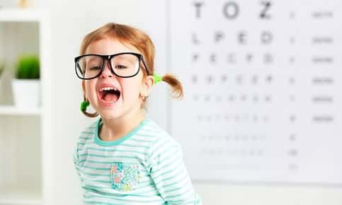 A child at their first visit to the optometrist